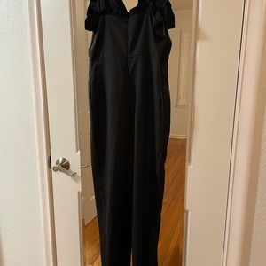 Black ruffle jumper. Only worn once! 5’1 in picture and fits perfectly